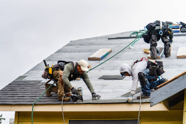 Professional Roofing technician working in Haworth, NJ